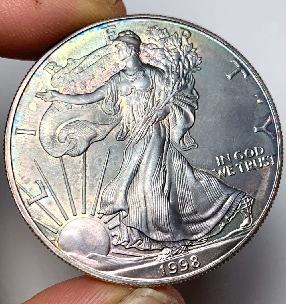 Toned 1998 American Silver Eagle: Winner shall receive the exact coin shown here. (RM/B)