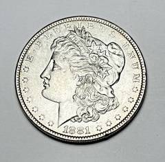 1881 Morgan Silver Dollar MS63: Winner shall receive the exact coin shown here. (AS/PB)