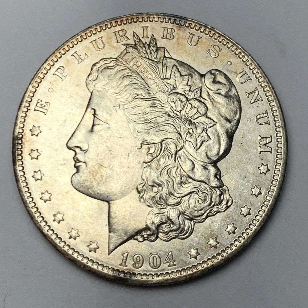 1904-O Morgan Silver Dollar MS65: Winner shall receive the exact coin shown here. (MR/B)