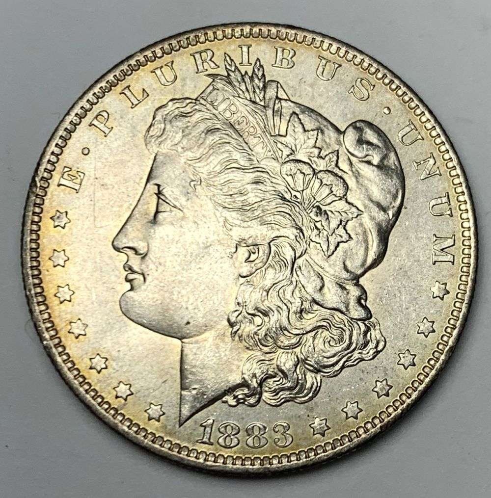 1883-O Morgan Silver Dollar MS64: Winner shall receive the exact coin shown here. (MR/B)