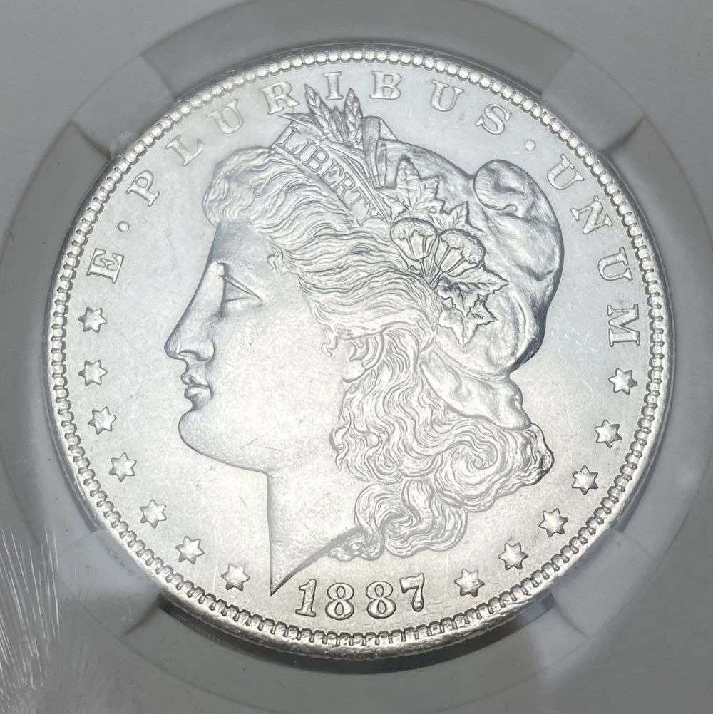 1887-O Morgan Silver Dollar MS65+ (1 of 4)