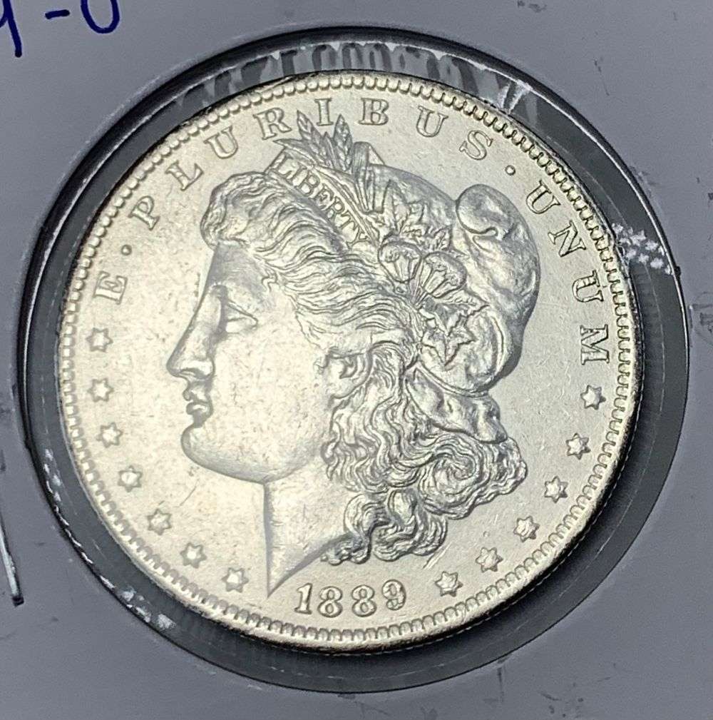 1889-O Morgan Silver Dollar AU58 (1 of 3)