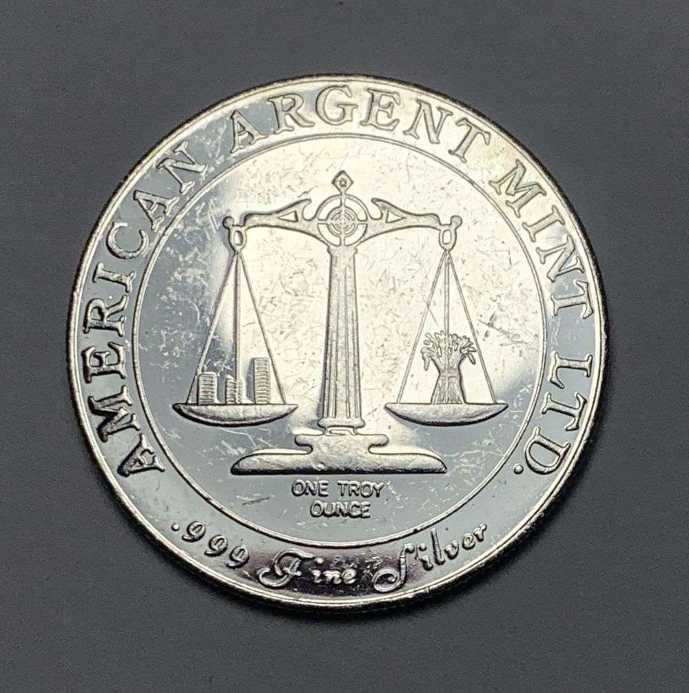 American Argent Mint World Trade .999 Silver 1 ozt: Winner shall receive the exact coin shown here. (MK/B)