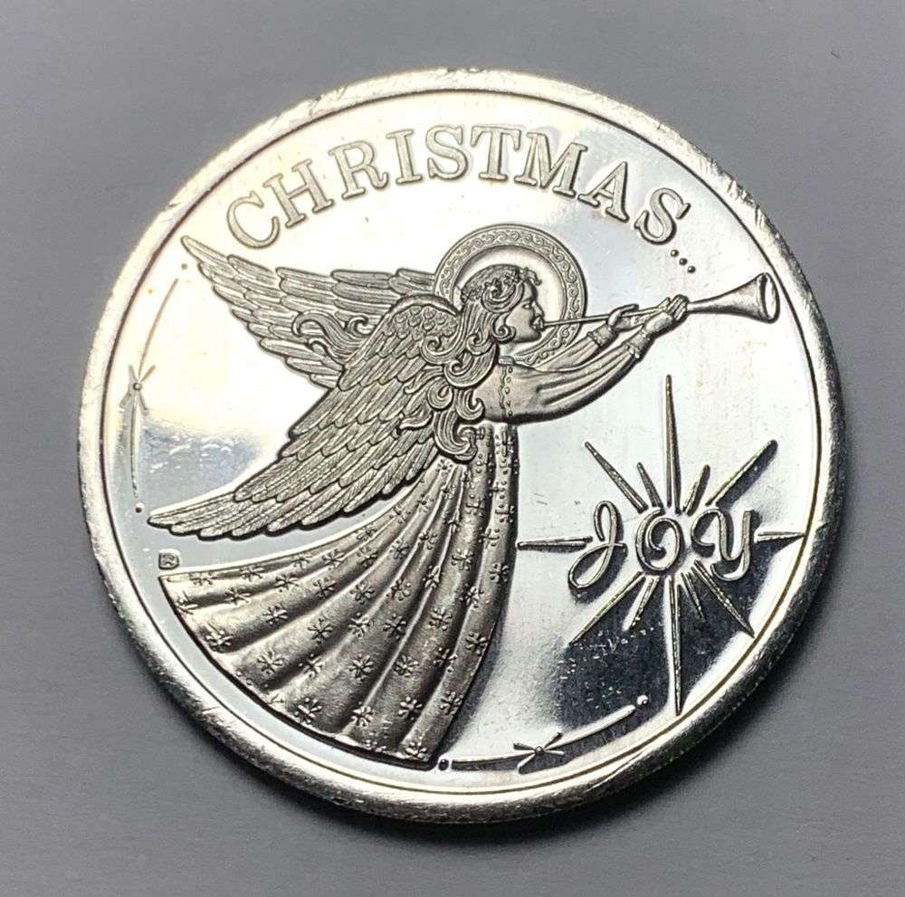 1992 Christmas Joy 1 ozt .999 Silver: Winner shall receive the exact coin shown here. (MK/B)