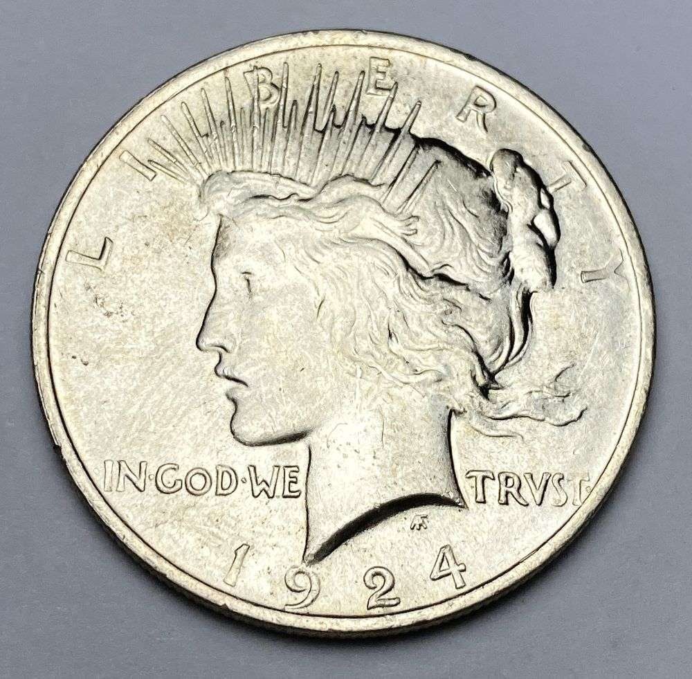 1924 Peace Silver Dollar MS65: Winner shall receive the exact coin shown here. (RR/PB)