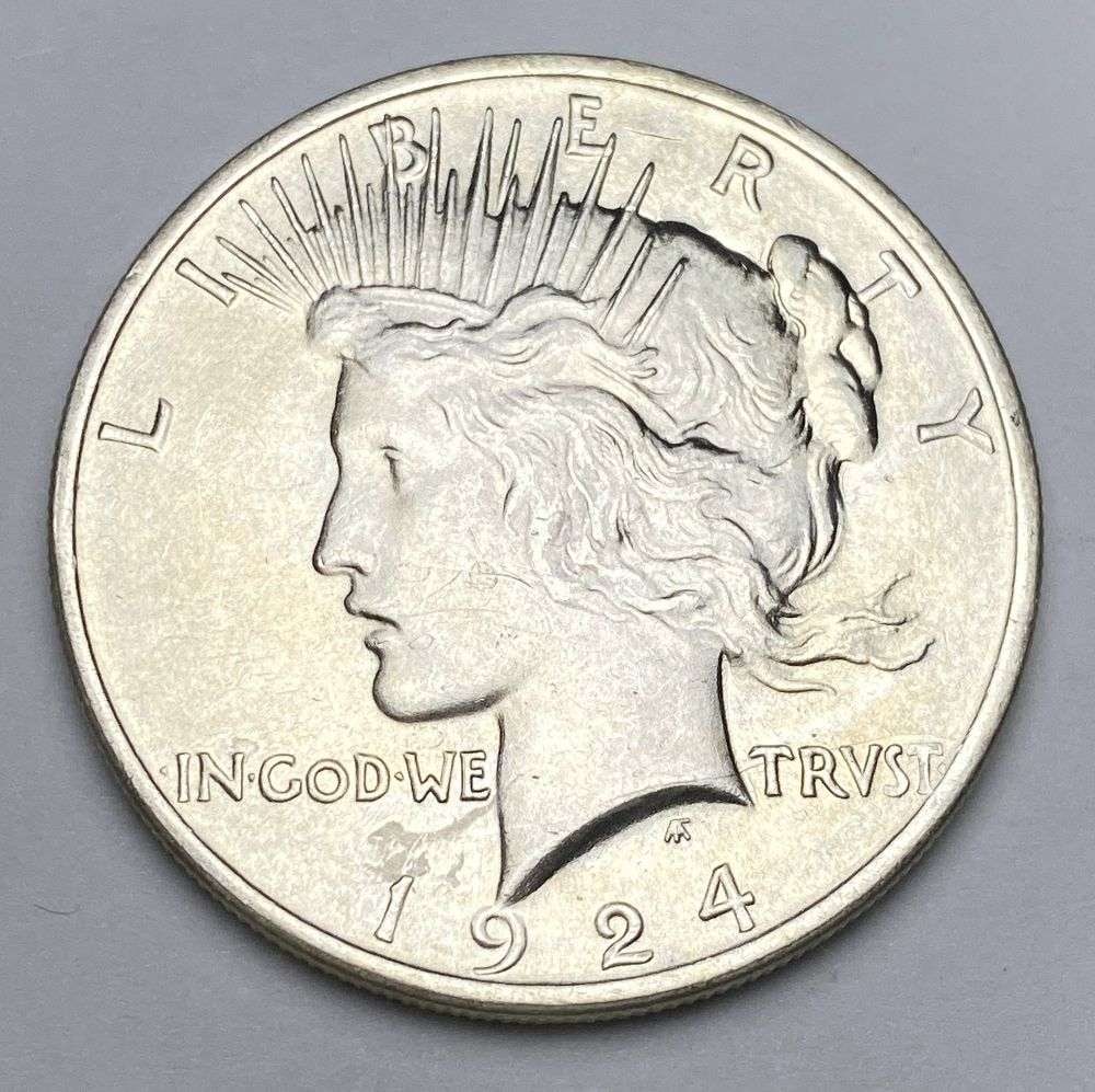 1924 Peace Silver Dollar MS65: Winner shall receive the exact coin shown here. (RR/PB)