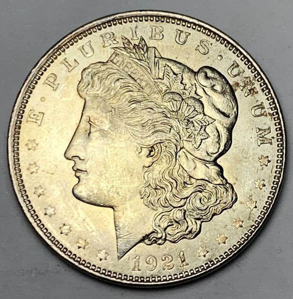 1921 Morgan Silver Dollar MS64: A very special consignment. Once in a great while, some really, really nice silver dollars will hit the market. These coins come from a old, old-timer! By order of the consignor, none of these coins a