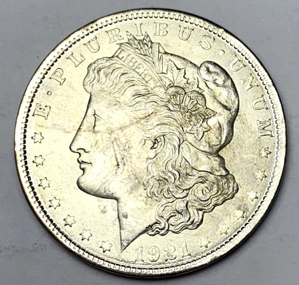 1921 Morgan Silver Dollar MS64: A very special consignment. Once in a great while, some really, really nice silver dollars will hit the market. These coins come from a old, old-timer! By order of the consignor, none of these coins a