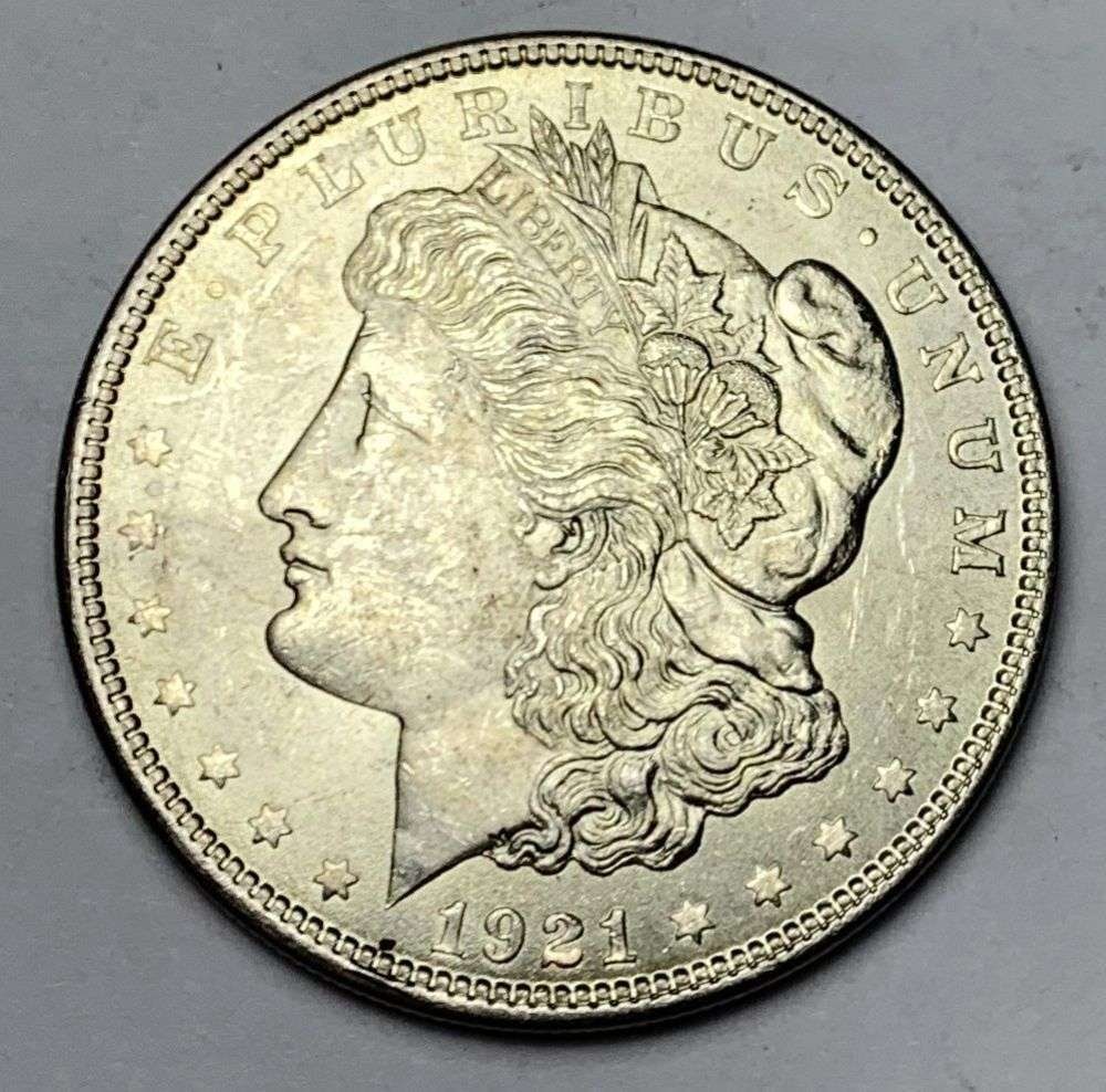 1921 Morgan Silver Dollar MS64: A very special consignment. Once in a great while, some really, really nice silver dollars will hit the market. These coins come from a old, old-timer! By order of the consignor, none of these coins a