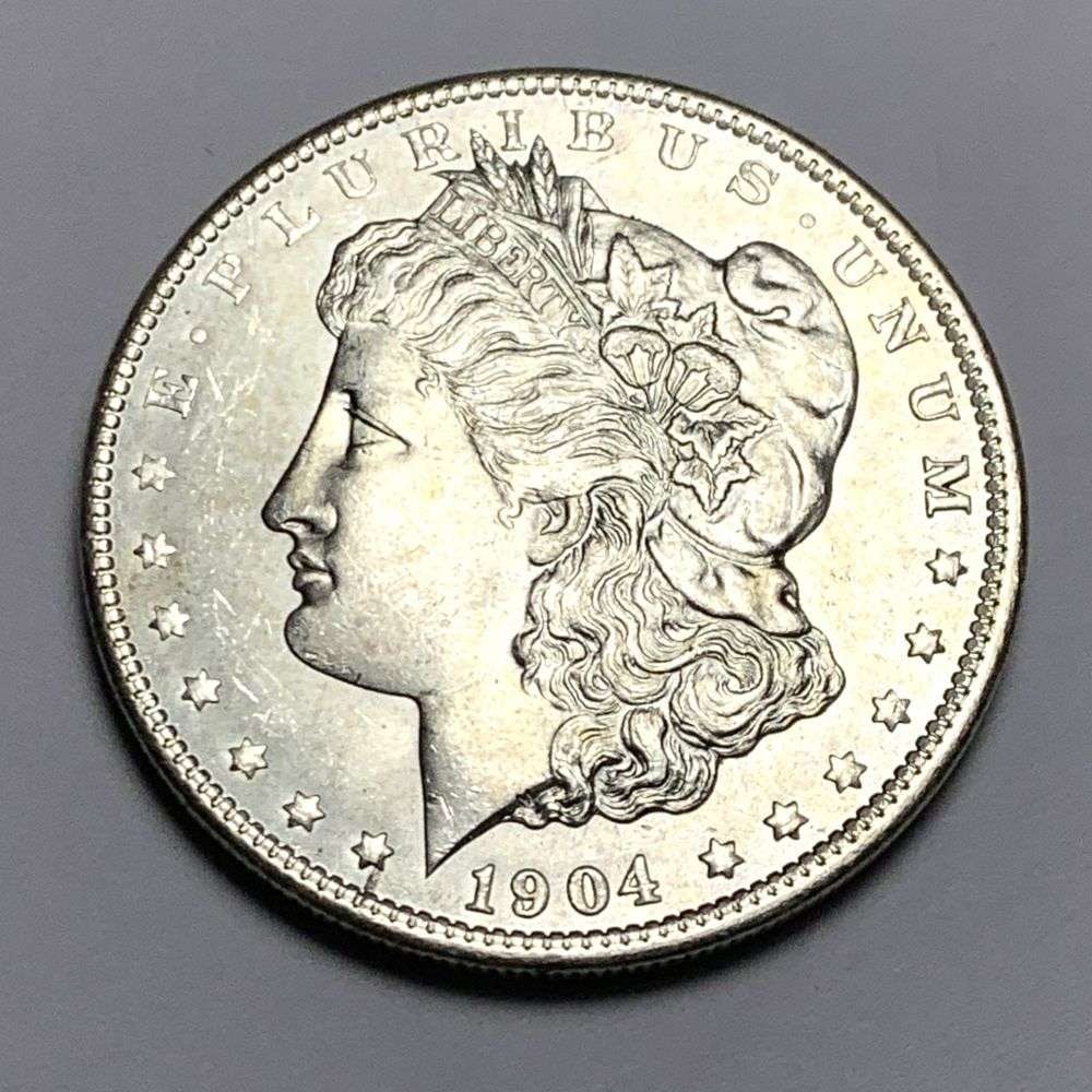 1904-O Morgan Silver Dollar MS64: A very special consignment. Once in a great while, some really, really nice silver dollars will hit the market. These coins come from a old, old-timer! By order of the consignor, none of these coins a
