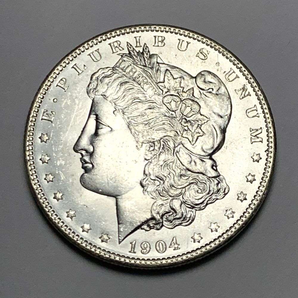 1904-O Morgan Silver Dollar MS64: A very special consignment. Once in a great while, some really, really nice silver dollars will hit the market. These coins come from a old, old-timer! By order of the consignor, none of these coins a
