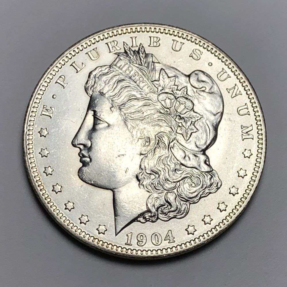 1904-O Morgan Silver Dollar MS64: A very special consignment. Once in a great while, some really, really nice silver dollars will hit the market. These coins come from a old, old-timer! By order of the consignor, none of these coins a