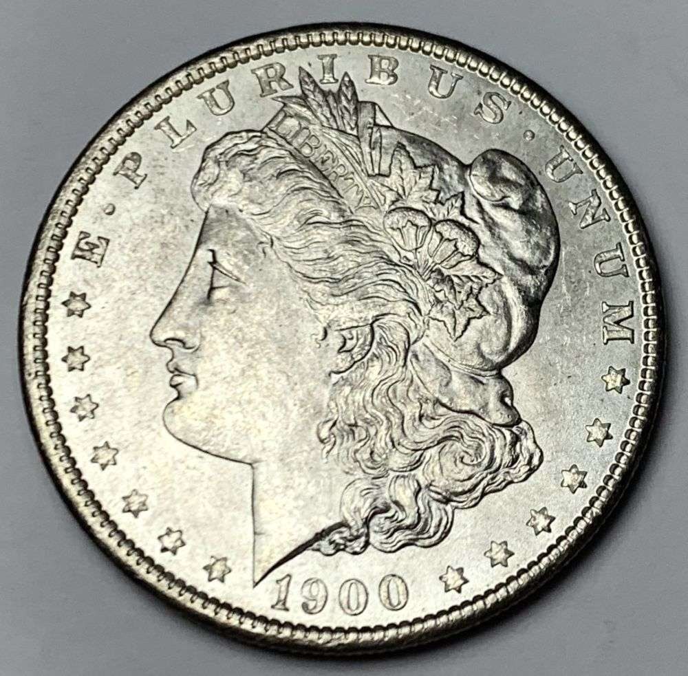 1900 Morgan Silver Dollar MS64: A very special consignment. Once in a great while, some really, really nice silver dollars will hit the market. These coins come from a old, old-timer! By order of the consignor, none of these coins a