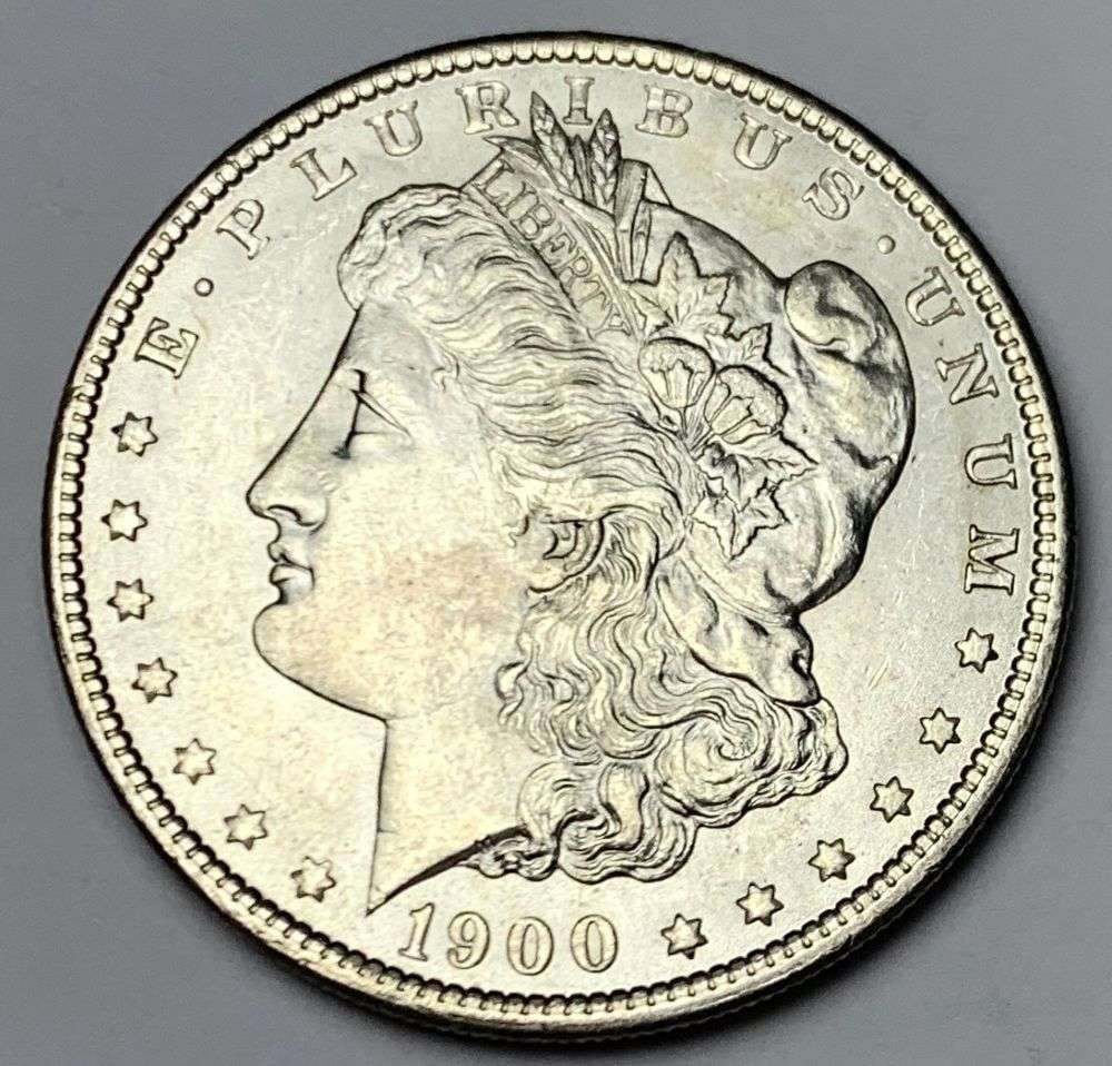 1900 Morgan Silver Dollar MS64: A very special consignment. Once in a great while, some really, really nice silver dollars will hit the market. These coins come from a old, old-timer! By order of the consignor, none of these coins a