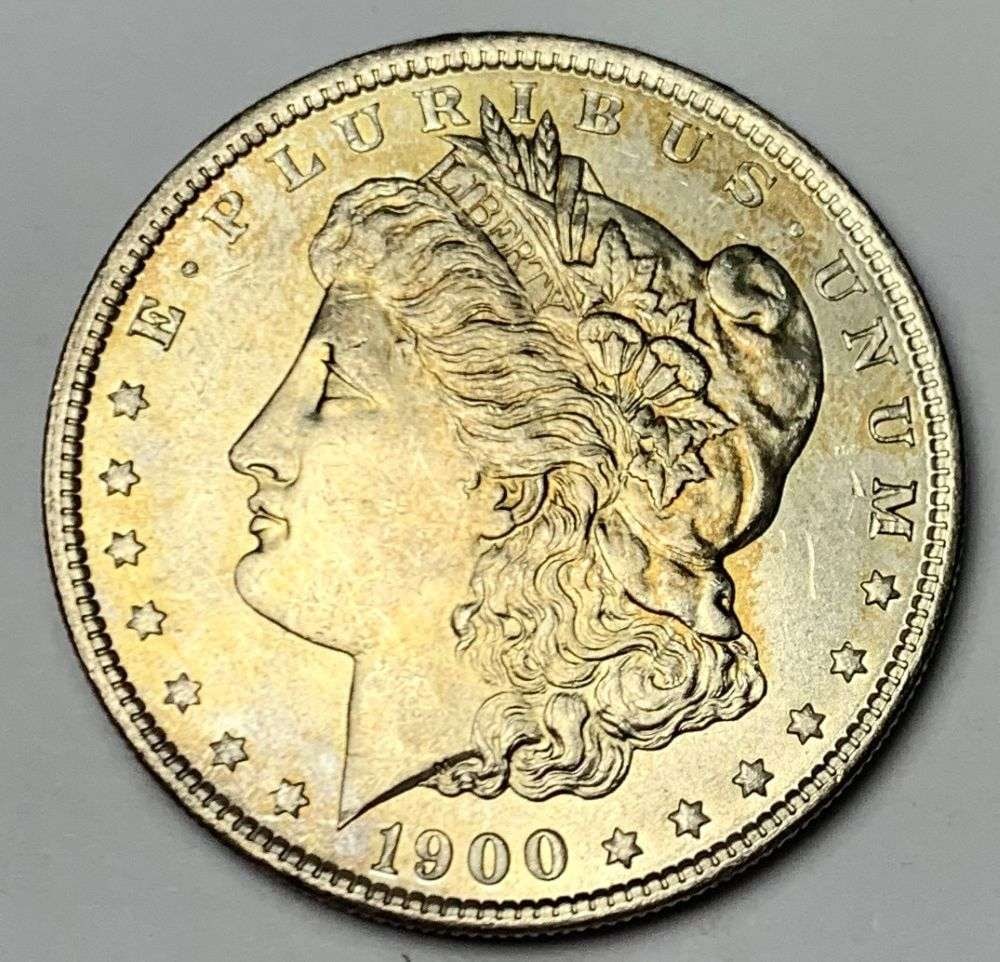 1900 Morgan Silver Dollar MS64: A very special consignment. Once in a great while, some really, really nice silver dollars will hit the market. These coins come from a old, old-timer! By order of the consignor, none of these coins a