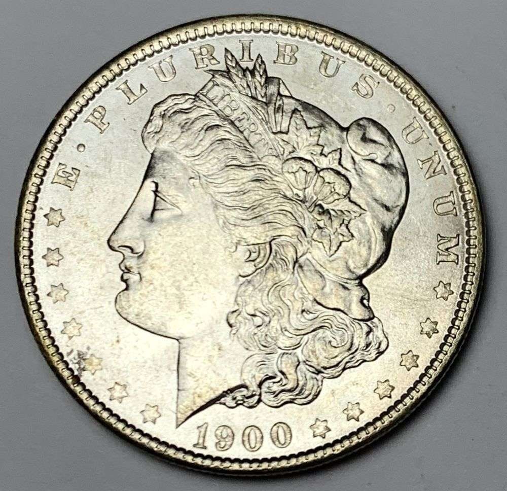 1900 Morgan Silver Dollar MS64: A very special consignment. Once in a great while, some really, really nice silver dollars will hit the market. These coins come from a old, old-timer! By order of the consignor, none of these coins a