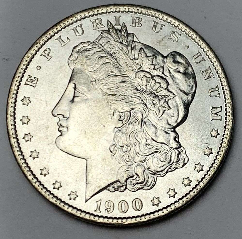 1900 Morgan Silver Dollar MS64: A very special consignment. Once in a great while, some really, really nice silver dollars will hit the market. These coins come from a old, old-timer! By order of the consignor, none of these coins a
