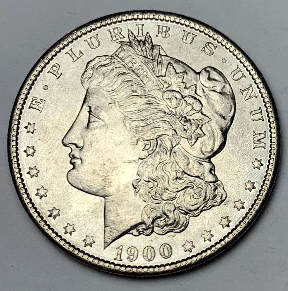 1900 Morgan Silver Dollar MS64: A very special consignment. Once in a great while, some really, really nice silver dollars will hit the market. These coins come from a old, old-timer! By order of the consignor, none of these coins a