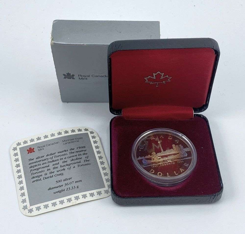 Rainbow Toned 1834 Canada Silver Dollar: Winner shall receive the exact coin shown here. (RR)