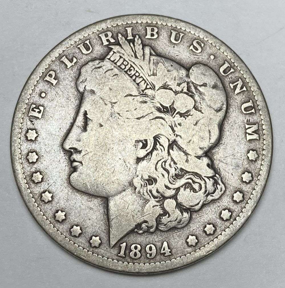 1894-O Morgan Silver Dollar VF: Winner shall receive the exact coin shown here. (RR)