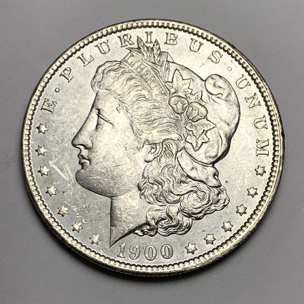 1900 Morgan Silver Dollar MS65: A very special consignment. Once in a great while, some really, really nice silver dollars will hit the market. These coins come from a old, old-timer! By order of the consignor, none of these coins a