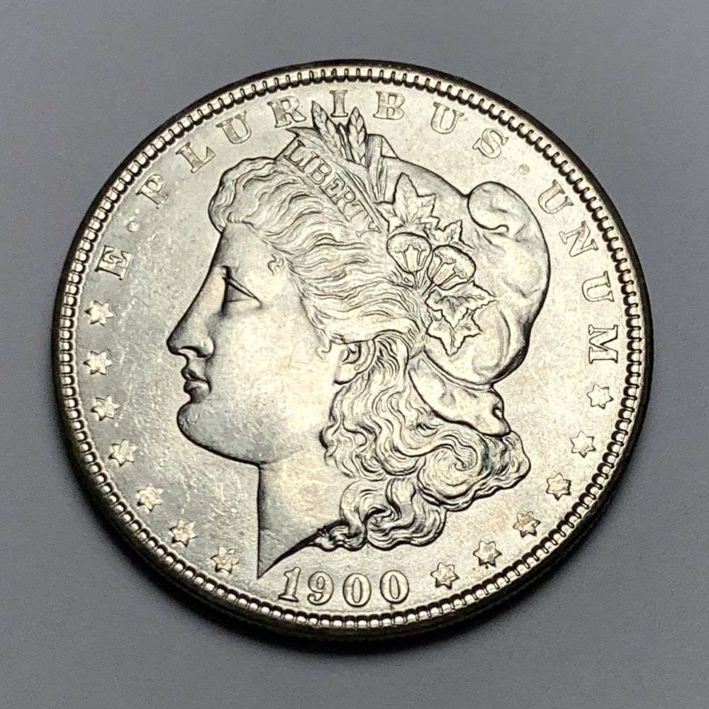 1900 Morgan Silver Dollar MS65: A very special consignment. Once in a great while, some really, really nice silver dollars will hit the market. These coins come from a old, old-timer! By order of the consignor, none of these coins a