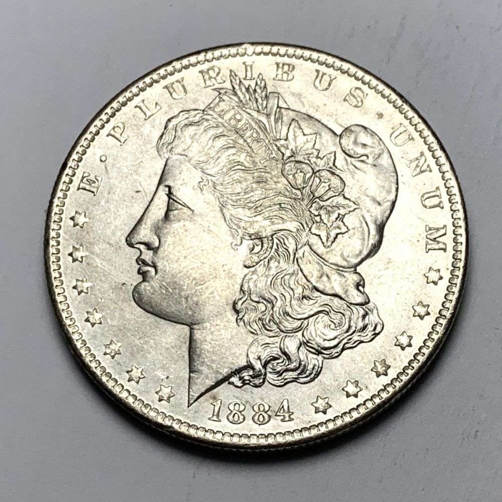 1884-O Morgan Silver Dollar MS65: A very special consignment. Once in a great while, some really, really nice silver dollars will hit the market. These coins come from a old, old-timer! By order of the consignor, none of these coins a