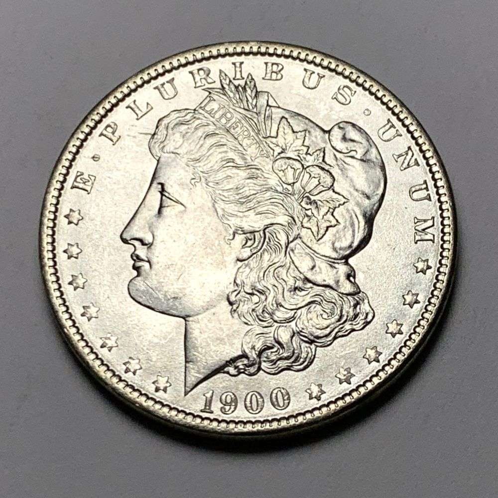 1900 Morgan Silver Dollar MS65: A very special consignment. Once in a great while, some really, really nice silver dollars will hit the market. These coins come from a old, old-timer! By order of the consignor, none of these coins a