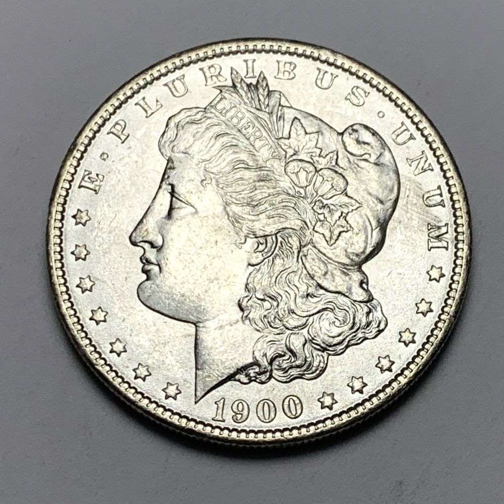 1900 Morgan Silver Dollar MS65: A very special consignment. Once in a great while, some really, really nice silver dollars will hit the market. These coins come from a old, old-timer! By order of the consignor, none of these coins a