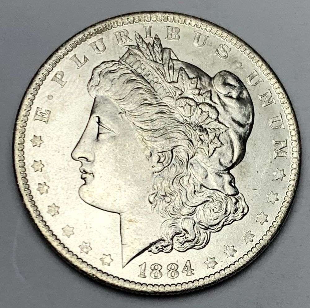 1884-O Morgan Silver Dollar MS64: A very special consignment. Once in a great while, some really, really nice silver dollars will hit the market. These coins come from a old, old-timer! By order of the consignor, none of these coins a