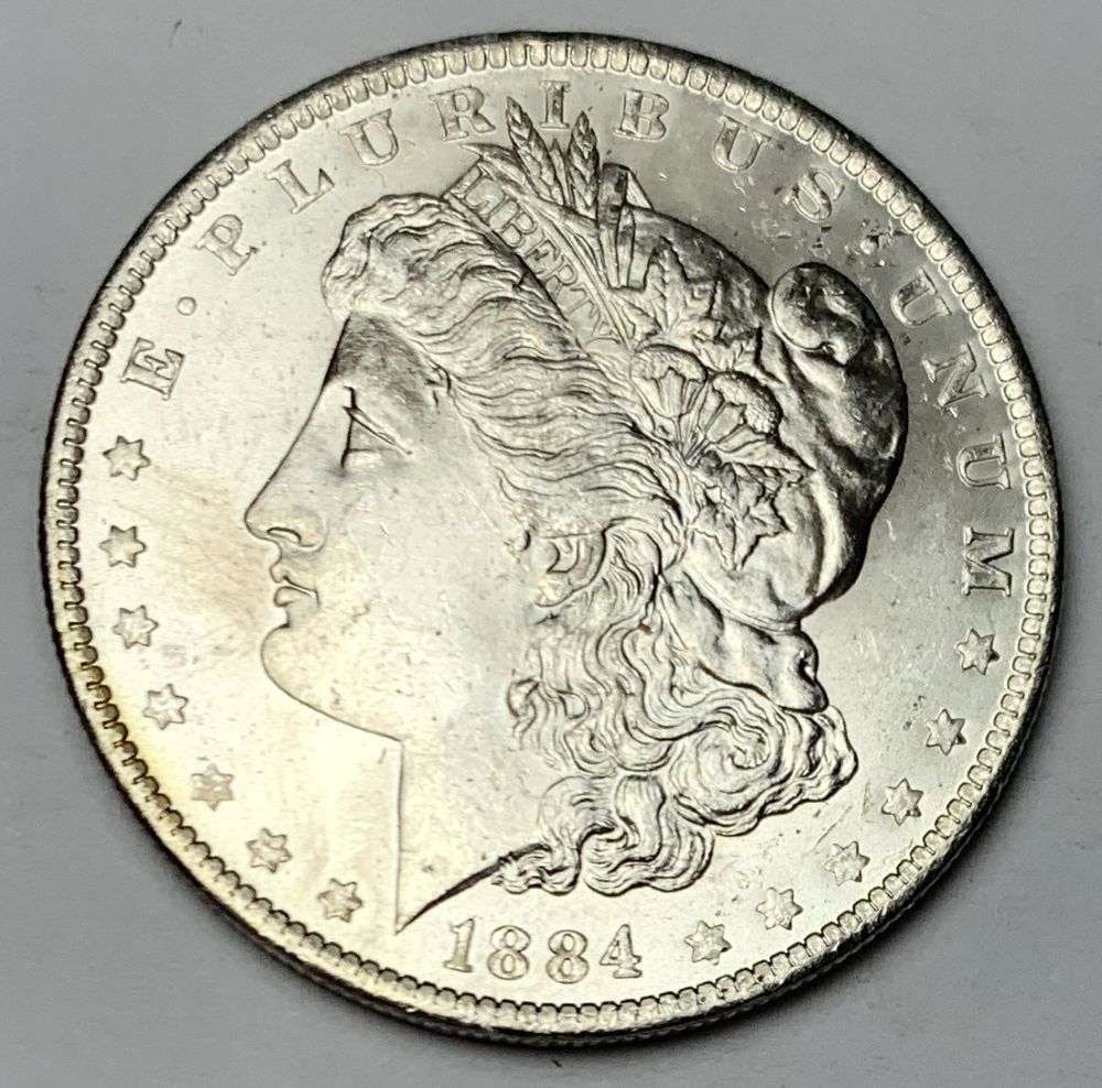 1884-O Morgan Silver Dollar MS64: A very special consignment. Once in a great while, some really, really nice silver dollars will hit the market. These coins come from a old, old-timer! By order of the consignor, none of these coins a