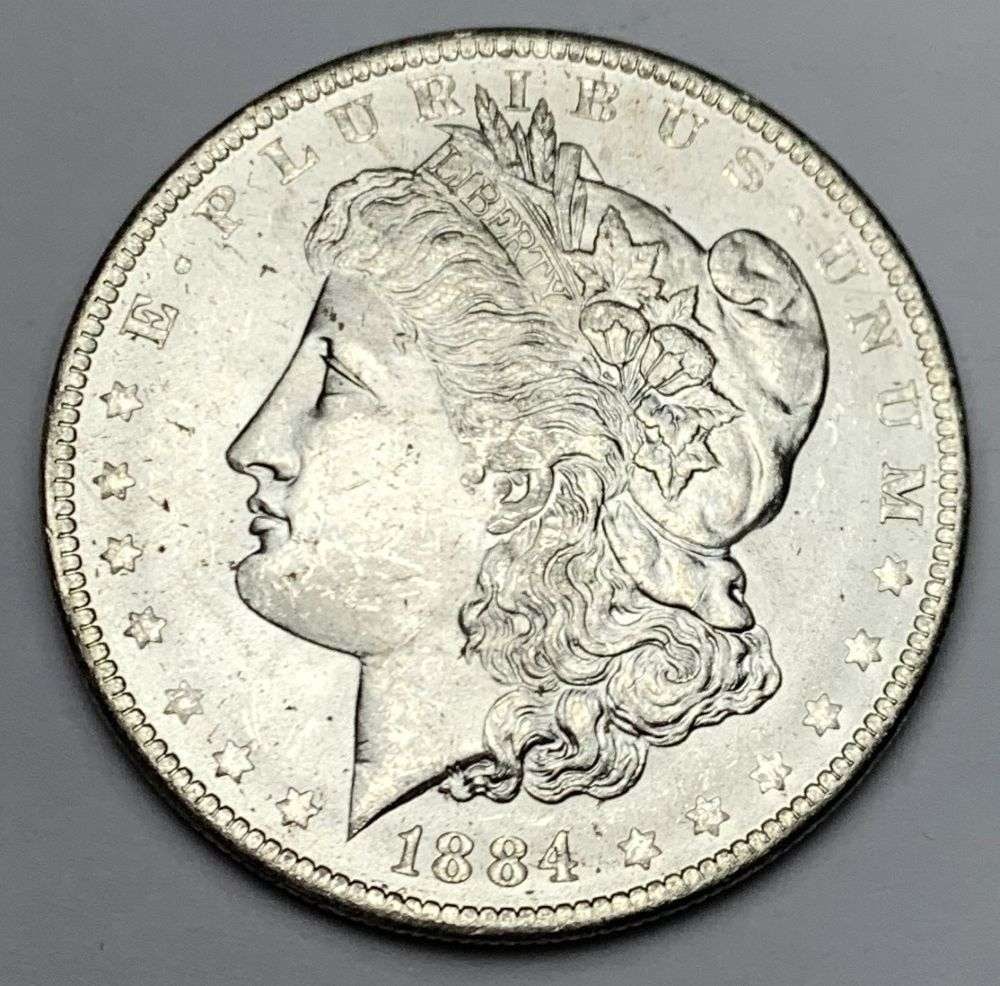 1884-O Morgan Silver Dollar MS64: A very special consignment. Once in a great while, some really, really nice silver dollars will hit the market. These coins come from a old, old-timer! By order of the consignor, none of these coins a