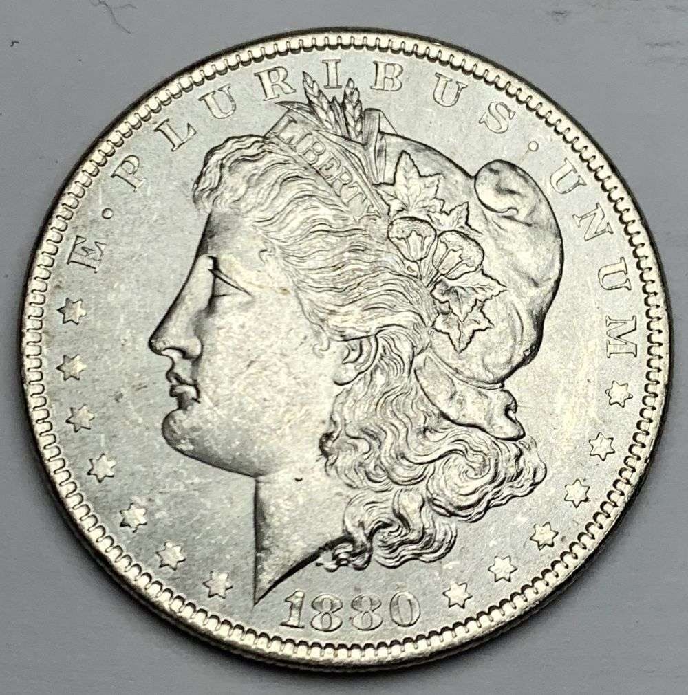 Better Date 1880 Morgan Silver Dollar MS64: A very special consignment. Once in a great while, some really, really nice silver dollars will hit the market. These coins come from a old, old-timer! By order of the consignor, none of these coins a