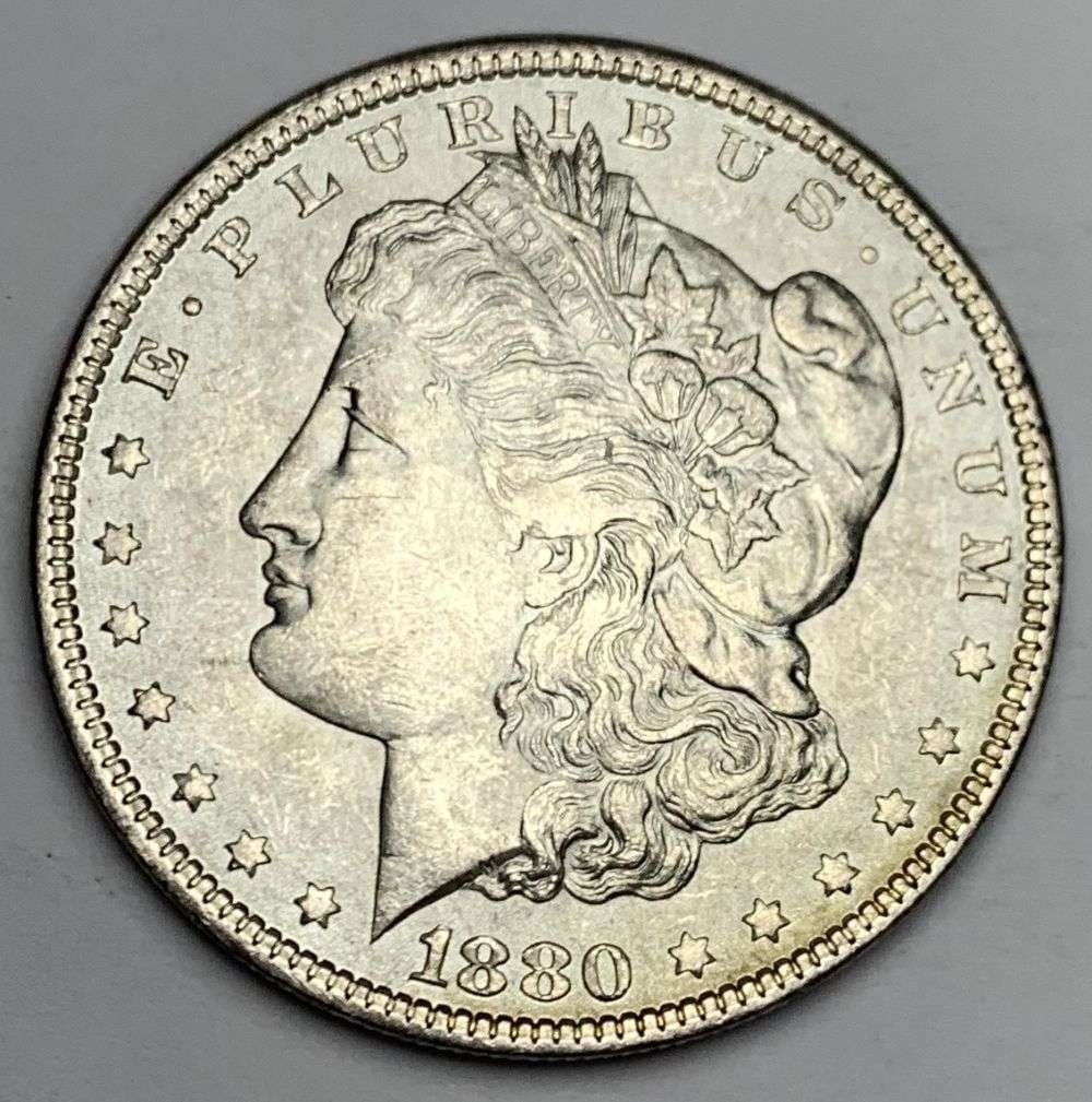 Better Date 1880 Morgan Silver Dollar MS64: A very special consignment. Once in a great while, some really, really nice silver dollars will hit the market. These coins come from a old, old-timer! By order of the consignor, none of these coins a