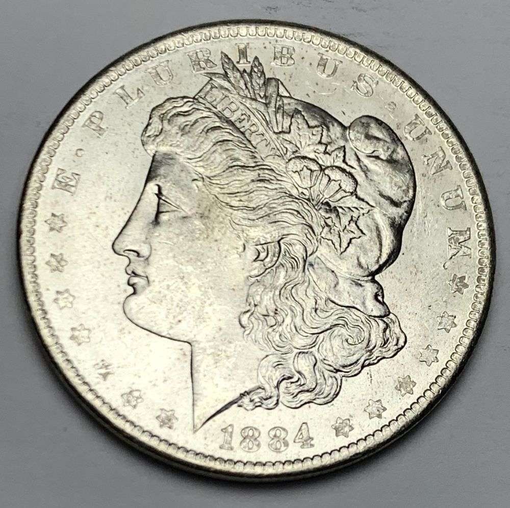 1884-O Morgan Silver Dollar MS64: A very special consignment. Once in a great while, some really, really nice silver dollars will hit the market. These coins come from a old, old-timer! By order of the consignor, none of these coins a