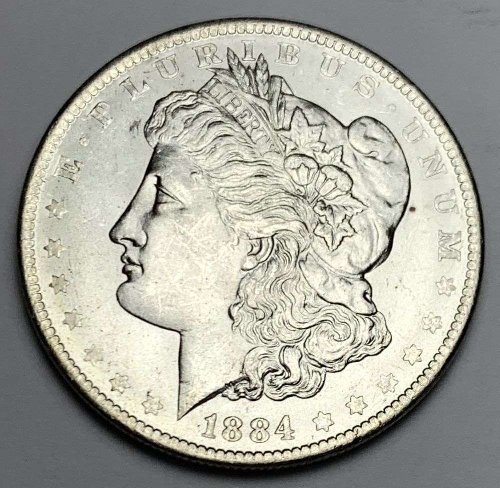 1884-O Morgan Silver Dollar MS64: A very special consignment. Once in a great while, some really, really nice silver dollars will hit the market. These coins come from a old, old-timer! By order of the consignor, none of these coins a