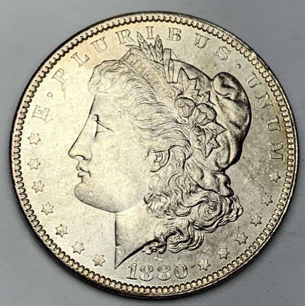 Better Date 1880 Morgan Silver Dollar MS64: A very special consignment. Once in a great while, some really, really nice silver dollars will hit the market. These coins come from a old, old-timer! By order of the consignor, none of these coins a