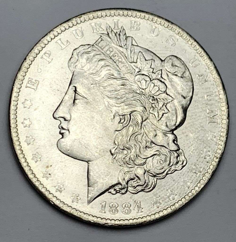 1884-O Morgan Silver Dollar MS64: A very special consignment. Once in a great while, some really, really nice silver dollars will hit the market. These coins come from a old, old-timer! By order of the consignor, none of these coins a