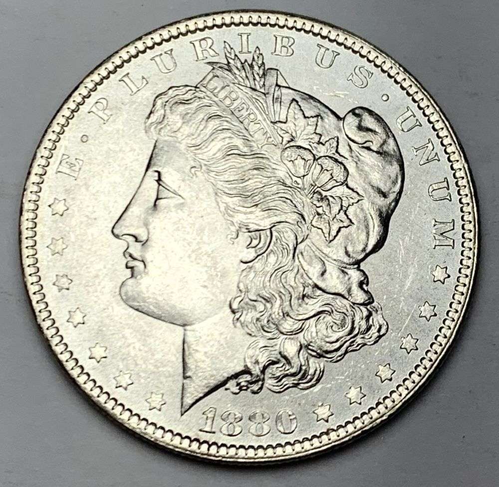 Better Date 1880 Morgan Silver Dollar MS64: A very special consignment. Once in a great while, some really, really nice silver dollars will hit the market. These coins come from a old, old-timer! By order of the consignor, none of these coins a