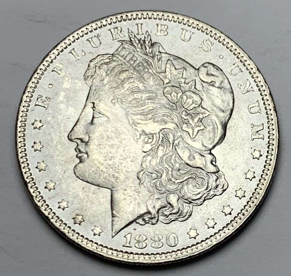 Better Date 1880 Morgan Silver Dollar MS64: A very special consignment. Once in a great while, some really, really nice silver dollars will hit the market. These coins come from a old, old-timer! By order of the consignor, none of these coins a