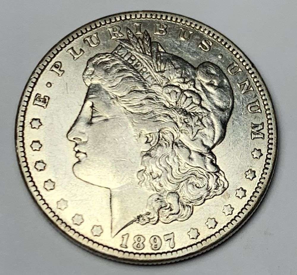 1897-O Morgan Silver Dollar AU55: Winner shall receive the exact coin shown here. (MR/B)