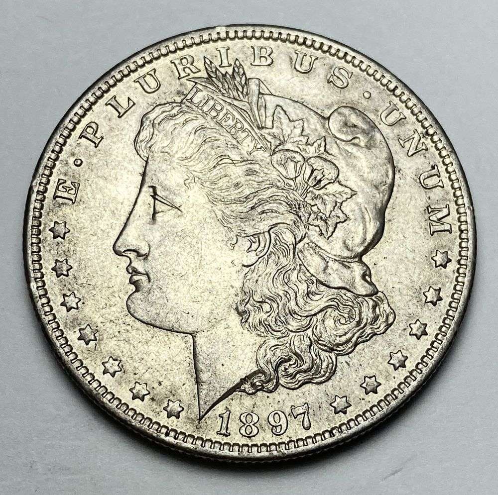 1897-O Morgan Silver Dollar MS62: Winner shall receive the exact coin shown here. (MR/B)