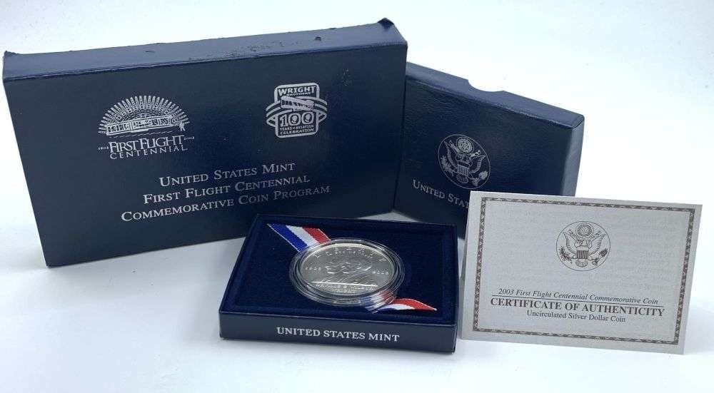 2003-P First Flight Centennial Commemorative Silver Dollar OGP: Winner shall receive the exact coin shown here. (MR/RB)