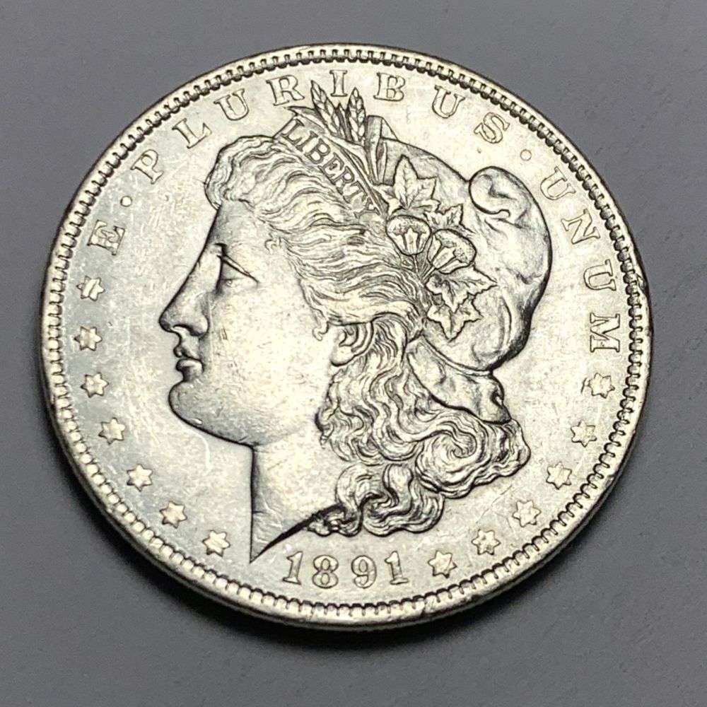 1891 Morgan Silver Dollar MS63: A very special consignment. Once in a great while, some really, really nice silver dollars will hit the market. These coins come from a old, old-timer! By order of the consignor, none of these coins a