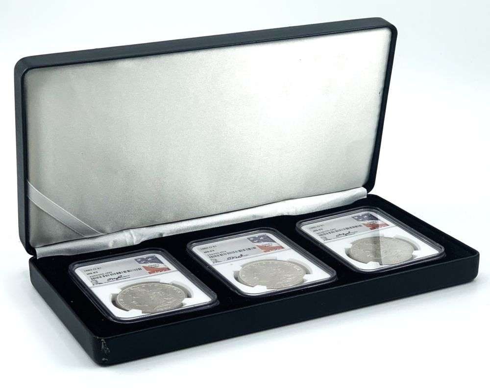 1883-O-1885-O Morgan Silver Dollar NGC MS63 Signed By David J Ryder Set (3-coins): Winner shall receive the exact set (3-coins) shown here. (MK/URB)