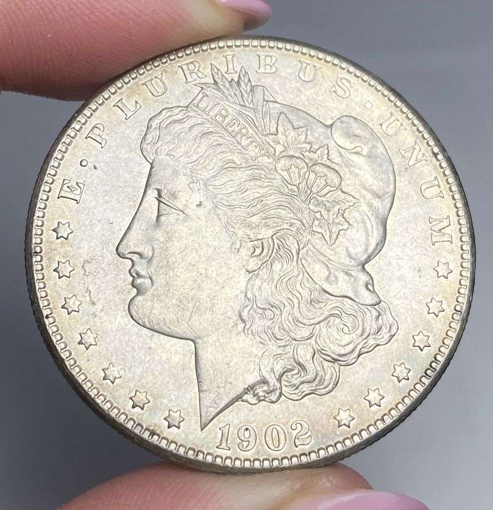 1902-O Morgan Silver Dollar MS64: A very special consignment. Once in a great while, some really, really nice silver dollars will hit the market. These coins come from a old, old-timer! By order of the consignor, none of these coins a