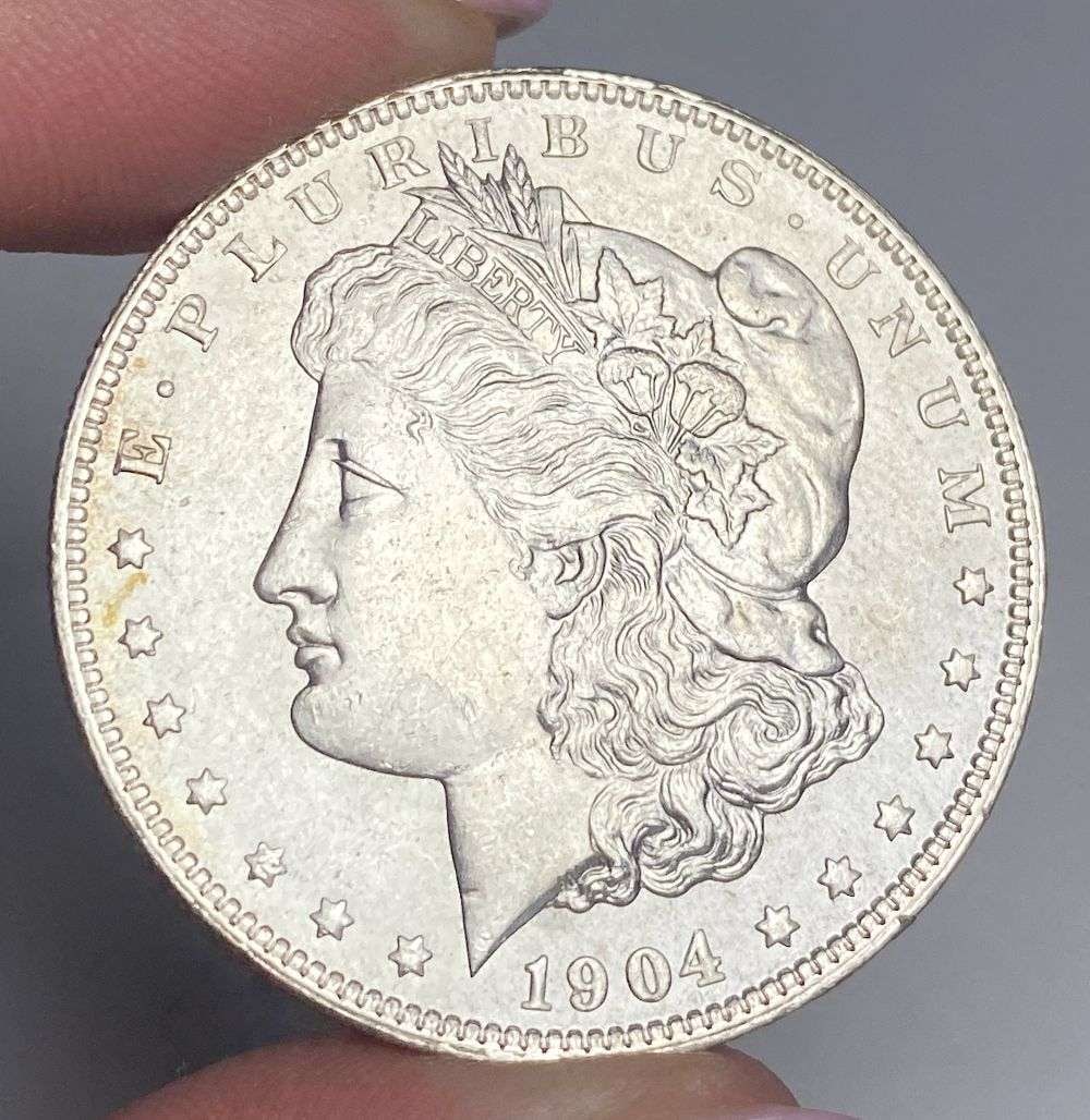 1904-O Morgan Silver Dollar MS65: A very special consignment. Once in a great while, some really, really nice silver dollars will hit the market. These coins come from a old, old-timer! By order of the consignor, none of these coins a