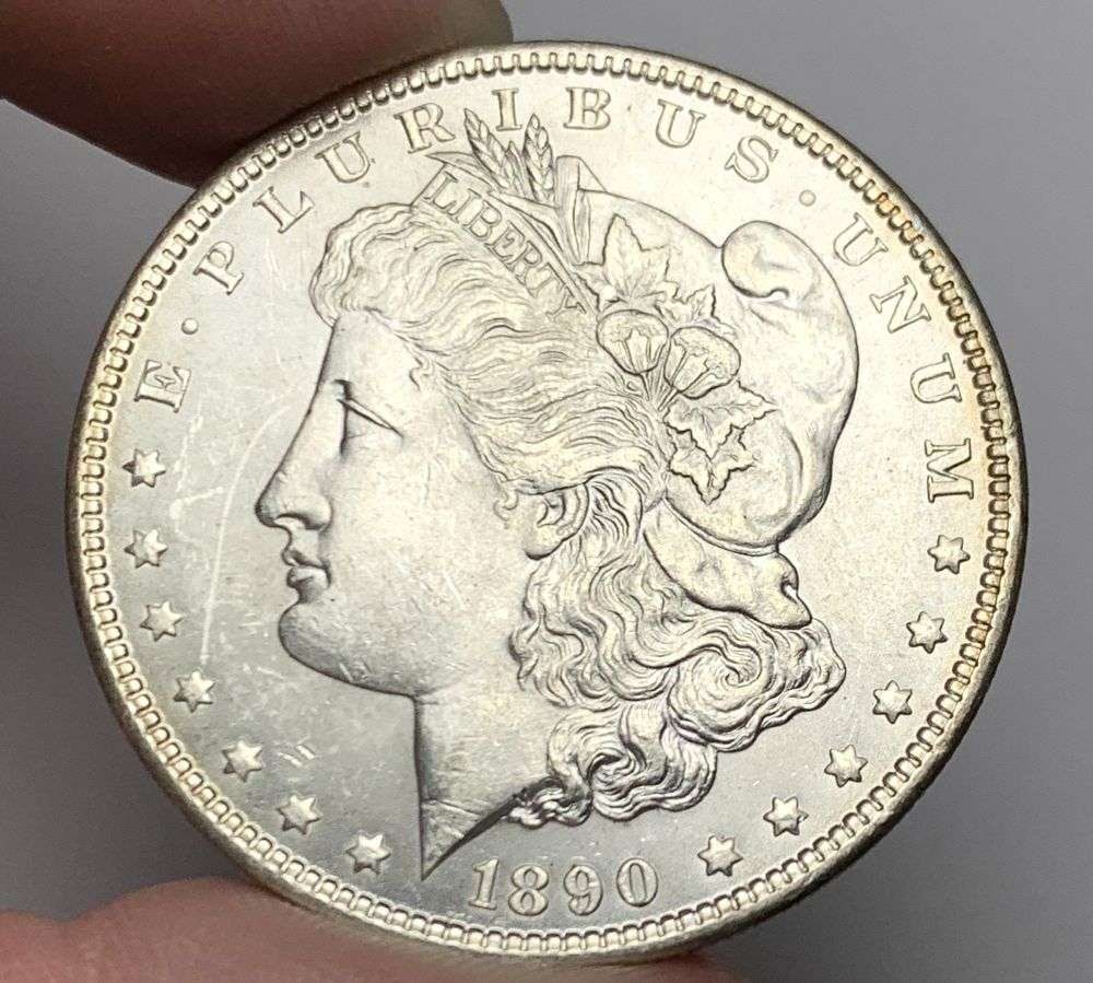 1890 Morgan Silver Dollar MS64: A very special consignment. Once in a great while, some really, really nice silver dollars will hit the market. These coins come from a old, old-timer! By order of the consignor, none of these coins a