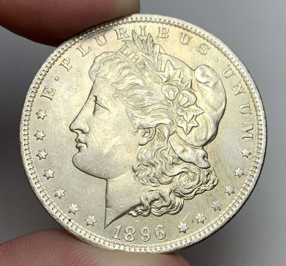 1896 Morgan Silver Dollar MS64: A very special consignment. Once in a great while, some really, really nice silver dollars will hit the market. These coins come from a old, old-timer! By order of the consignor, none of these coins a