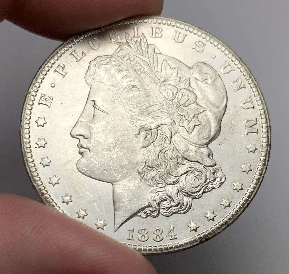 1884-CC Morgan Silver Dollar MS63: Winner shall receive the exact coin shown here. (MR/UBB)